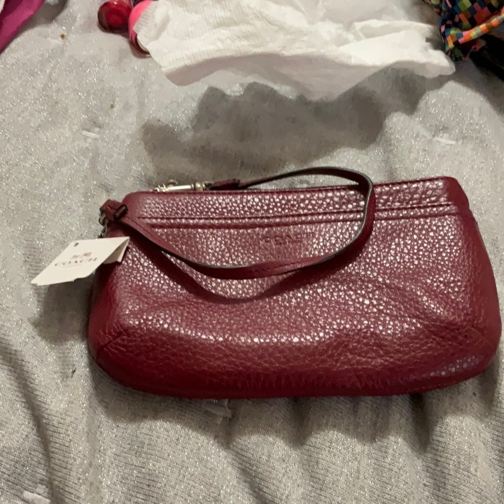 NWT coach burgundy wristlet